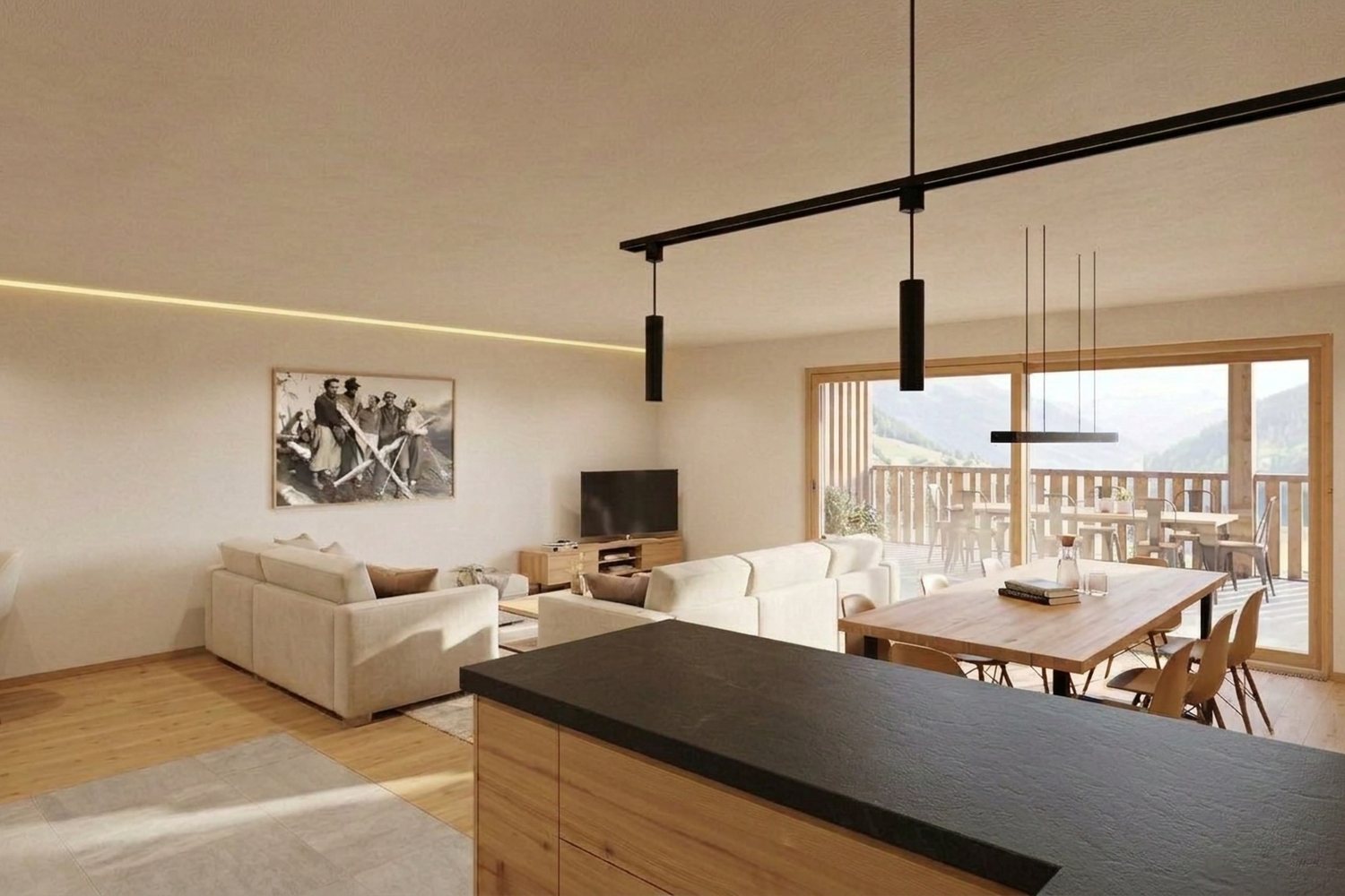 Visuel intérieur : îlot de cuisine au premier plan, séjour et table de repas devant la baie.