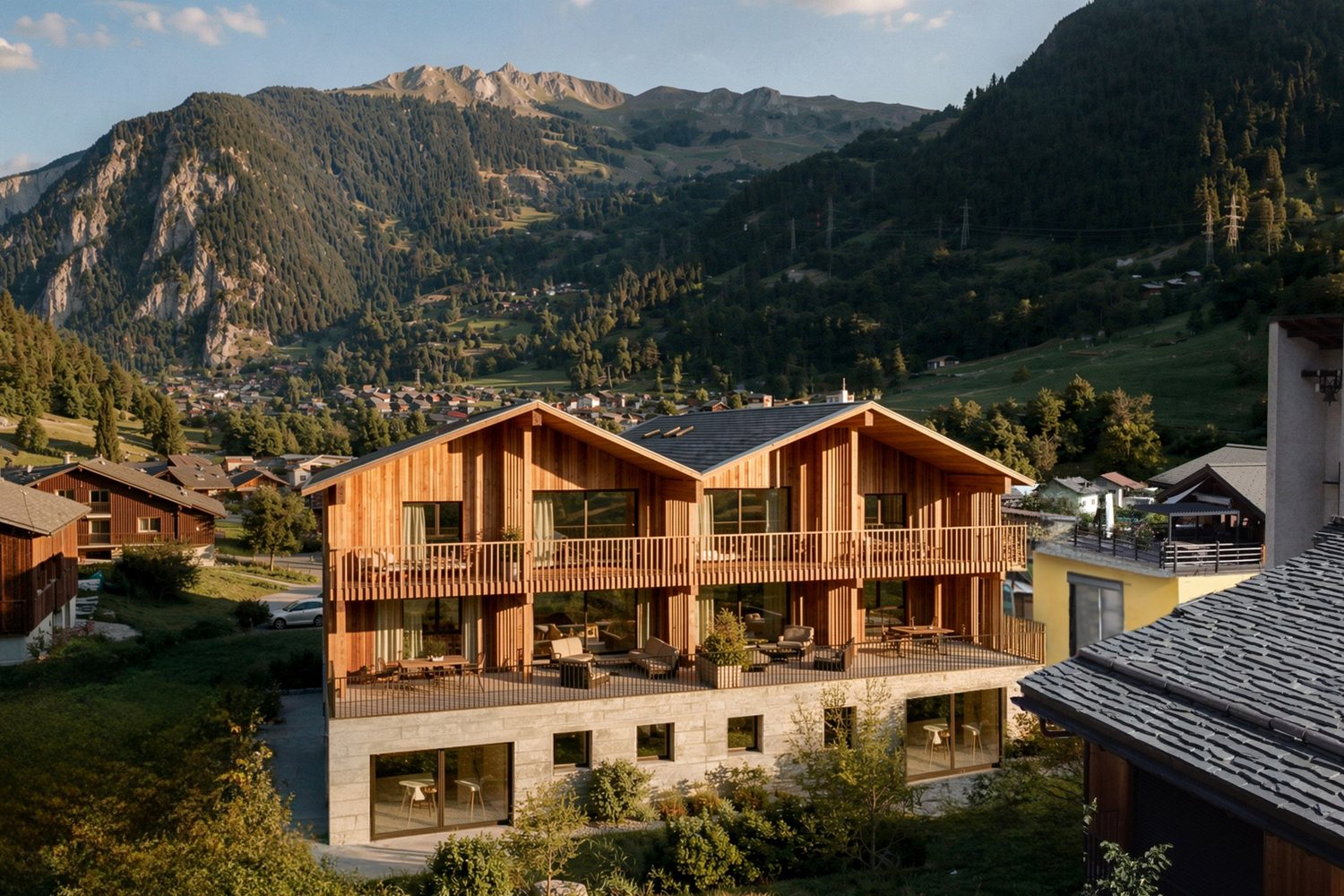 Visuel d'architecte de la Résidence Bindzi vue du sud : socle de béton clair, deux niveaux en mélèze vertical avec terrasses et balcons, montagnes du Val de Bagnes derrière.